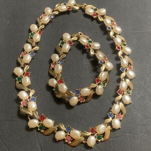 Vintage Estate Find..Pearl & Multi Rhinestones set in gold w/ matching bracelet